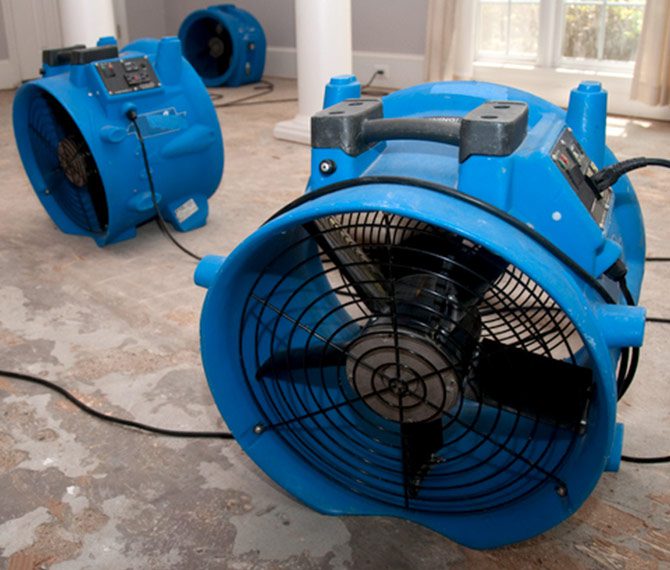 dehumidifiers-set-up-in-a-water-damaged-room
